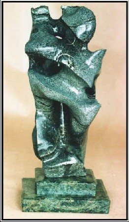 The work IV/2 is a small sculpture from serpentine. It has many vertical and horizontal holes.